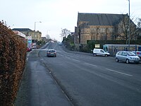 The point at which Larbert merges into Stenhousemuir is known as "The Brae". The photograph is taken looking east into Stenhousemuir, with Larbert West Church in the foreground. Larbert Stenhousemuir.JPG