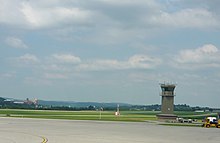 Control tower with Saint Vincent College in the background