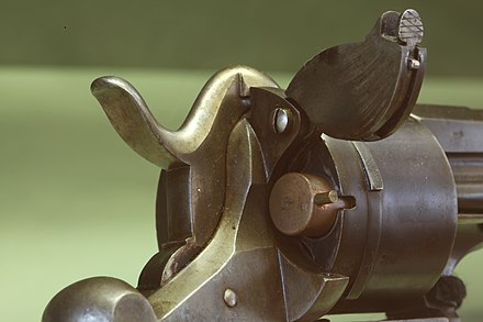 Detail of a Lefaucheux M1858 pistol. Notice the pin protruding from the cartridge.