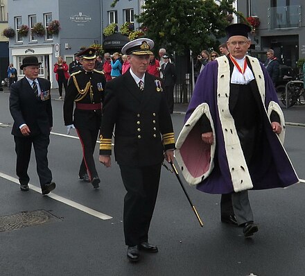 Bailiff Richard Collas (right) attending the Queen's birthday parade 2016 in his formal robes