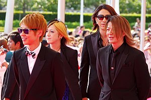 Glay bij de 2014 MTV Video Music Awards Japan.  Van links naar rechts: Jiro, Hisashi, Takuro, Teru.