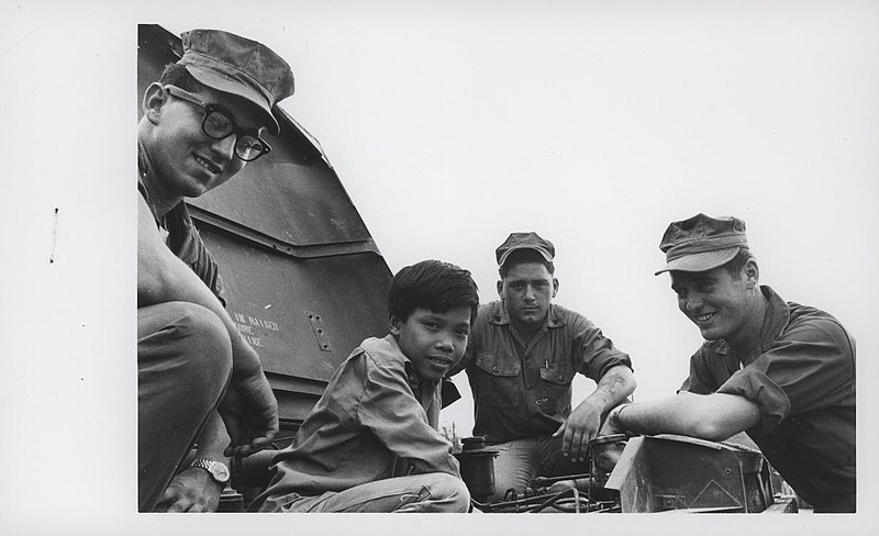 File:Marines with Vietnamese Boy, 1968 (29051143520).jpg