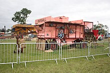 A Marshall Threshing machine being demonstrated at the Holcot Steam Rally 2008 in Northamptonshire, with a Massey-Harris baler attached (rhs) Marshall threshing machine at Holcot 08.JPG