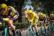 Team Jumbo-Visma's Mike Teunissen (centre) during stage two's team time trial, wearing the general classification leader's yellow jersey following his unexpected victory of the opening stage Mike Teunissen en jaune.jpg