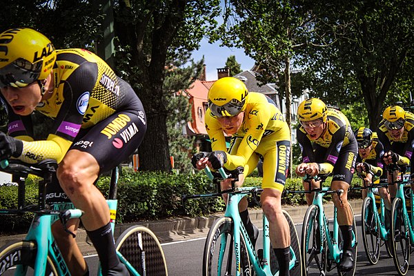 Teunissen (second left) in the yellow jersey, as part of Team Jumbo–Visma, during stage 2 of the 2019 Tour de France. He lost the race lead the follow