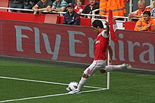 Arteta taking a corner kick for Arsenal in 2011 Mikel Arteta corner kick Arsenal vs Swansea.jpg