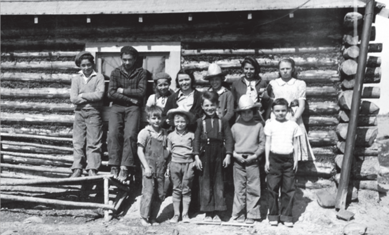 File:Mildred Hall, the first public school teacher in the NWT, and her students, in 1939.png