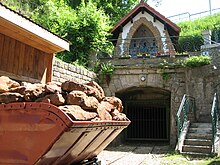 Entrance of the former Cockerill mine, Ellergronn, near Esch-sur-Alzette, with a wayside chapel above the entrance Mine Cockerill Esch-Alzette 2006-06.JPG