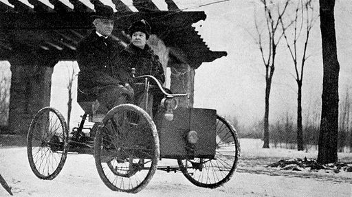 Mr and Mrs Henry Ford in his first car