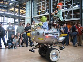 The Muppet Mobile Lab at the Pixar Studios, featuring two Muppets, Honeydew and Beaker.