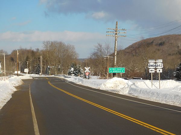 NY 242 eastbound at the junction with NY 240 in Ashford
