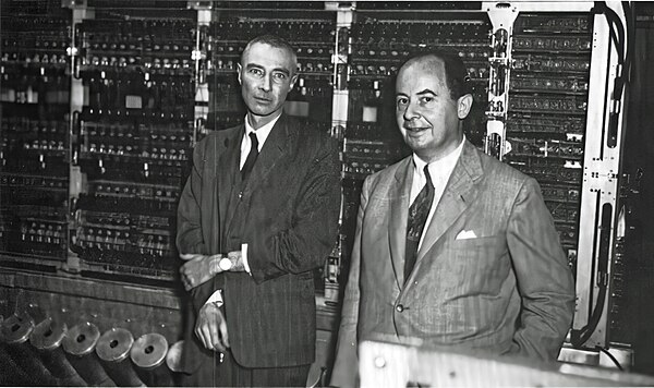 J. Robert Oppenheimer and John von Neumann in front of the IAS machine