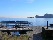 Vista della Rocca di Manerba e dell'Isola di San Biagio, detta dei conigli, dal Porto di San Felice del Benaco.