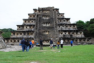 The Pyramid of Niches at El Tajin. The xicalcoliuhqui motif can be found on either side of the lower portion of the stairs. PyramidNiches1.JPG