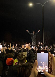 Rich The Kid, standing on the top of his car, right after Y=$' listening party for their album Vultures 1, in Bologna, Italy (2024) Rich The Kid Bologna.jpg