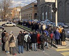 Russian immigrants outside the Russian embassy in Yerevan, Armenia as part of the "Noon Against Putin" event, 17 March 2024 Russian voters line up at embassy in Armenia 2.jpg