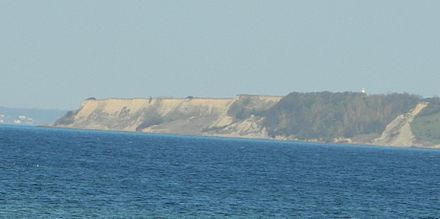 Typical Scanian coastline, here southern peak of Ven island in Øresund. The yellow colour indicates sand rather than chalk, while white colour at similar cliffs indicates chalk rather than sand