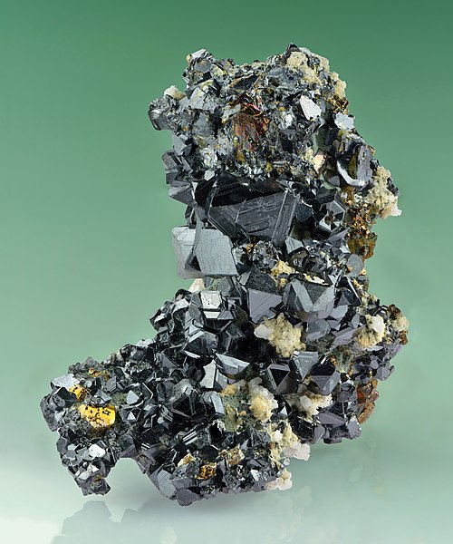 Black crystals of sphalerite with minor chalcopyrite and calcite