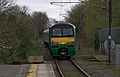 2014-04-05 13:07 London Midland 321417 departs St Albans Abbey.