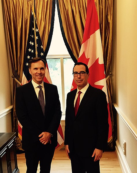 Morneau with Steven Mnuchin in June 2017