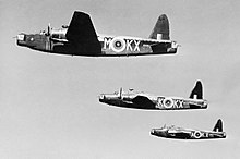 Three 311 Squadron Wellington Mk IC medium bombers over Norfolk in March 1941 Three Wellington Mk ICs of No. 311 (Czechoslovak) Squadron RAF based at East Wretham, Norfolk, March 1941. CH2265.jpg