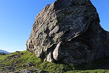 Blueschist block embedded in serpentinite matrix melange on the west side of Ring Mountain. Turtle Rock blueschist block on Ring Mountain.jpg