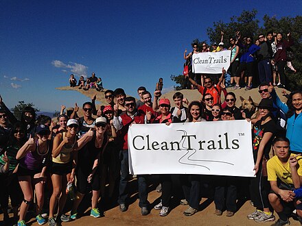 Volunteers at completed cleanup on hiking trail