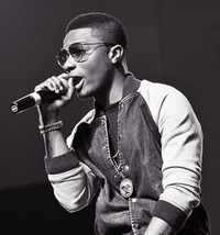 Nigerian musician Wizkid Wizkid at Iyanya's album launch concert, 2013 (Cropped).png