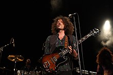 Frontman Andrew Stockdale wrote all of the songs on Victorious. Wolfmother (7002459625).jpg