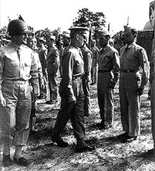 Major General Eldridge G. Chapman and Lieutenant General Lesley J. McNair, commander of Army Ground Forces, inspect troopers of the 13th Airborne Division, 13 May 1944. 13th Airborne Division.jpg