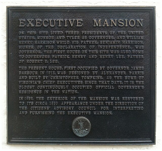 Plaque that is at the gate of the mansion, describing its history.