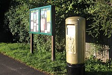 A post box outside the National Spinal Injuries Centre in Stoke Mandeville was painted gold in honour of the village's role in the history of the Paralympic movement. 2012 Paralympics Royal Mail gold postbox scheme launch box, Lower Road, Stoke Mandeville Hospital (1).jpg