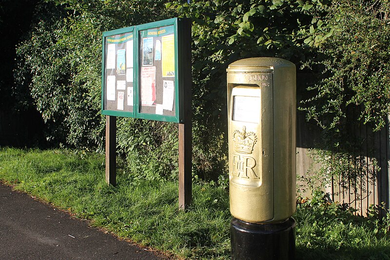 File:2012 Paralympics Royal Mail gold postbox scheme launch box, Lower Road, Stoke Mandeville Hospital (1).jpg