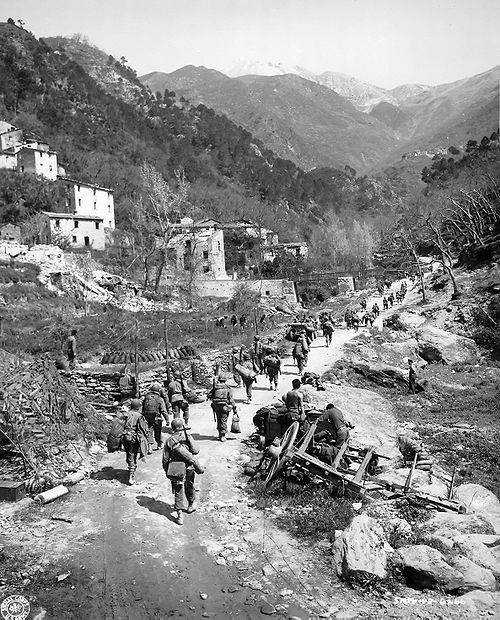 The soldiers of the 92nd Infantry Division enter the city of Montignoso (MS), Italy after having freed it from German troops, 8 April 1945.