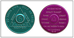 Sobriety token or "chip", given for specified lengths of sobriety. On the back is the Serenity Prayer. Here green is for six months of sobriety; purple is for nine months. AA - Medalj.jpg