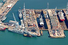 Northwest corner of No 3 Basin: the Pocket (left), D Lock (centre) and C Lock (right) Aerial Photograph of Portsmouth Dockyard and Surrounding Area. MOD 45144950.jpg