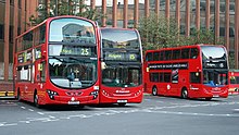 Tower Transit and Stagecoach London buses at Aldgate bus station in October 2014 Aldgate Trio (15653020515).jpg