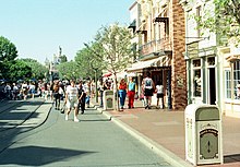 Street clock and lamp posts blending into the environment Anaheim, Disneyland, the main street.jpg