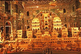 Gold carving depiction of the legendary Ayodhya at the Ajmer Jain temple. Ayodhya Nagri.jpg