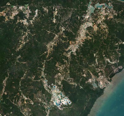 Satellite imagery showing tin mining scars on Bangka Island, Indonesia. BangkaIsland TinMines PlanetNICFI 2022.jpg