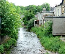 River Brenig, Teifi tributary, in Tregaron. The Tregaron area had a number of water-driven woollen mills and was a centre for manufacture of knitted hosiery. Brenig.jpg