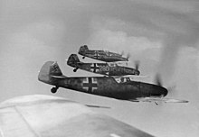 Bf 109 G-6s over France, 20 July 1944. The G-6 nearest the camera carries a Erla Haube canopy