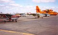 Воздушный танкер MNR Canadair CL-215 и контрактный самолет Cessna 337 для обнаружения пожара в Драйдене, Онтарио, 1995 год