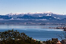 Great Florianópolis seen from Santa Catarina Island with Serra do Tabuleiro State Park (background).