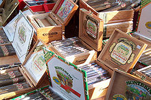 Arturo Fuente cigar boxes at 2005 Tampa Cigar Heritage Festival. The Montesino cigars are also produced by Tabacalera A. Fuente y Cia. Cigar Boxes.jpg