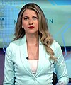 Claudia Fernández Valdivia en la conducción del informativo Notivisión, 2018.