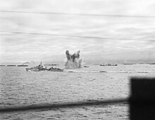 Convoy PQ 18 an underwater detonation erupts next to HMS Ashanti