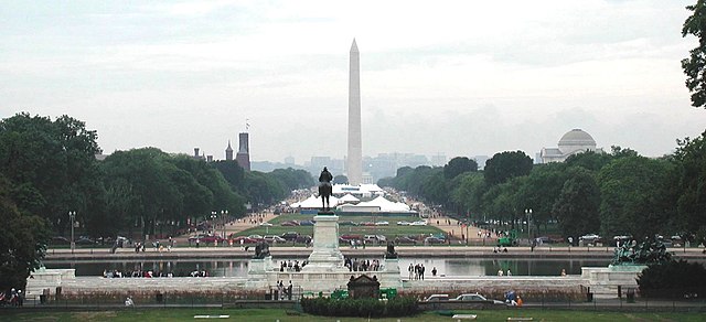 June 2004 view from the United States Capitol facing west, over the Grant Memorial and Capitol Reflecting Pool in the foreground, and across the Natio