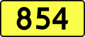 English: Sign of DW 854 with oficial font Drogowskaz and adequate dimensions.