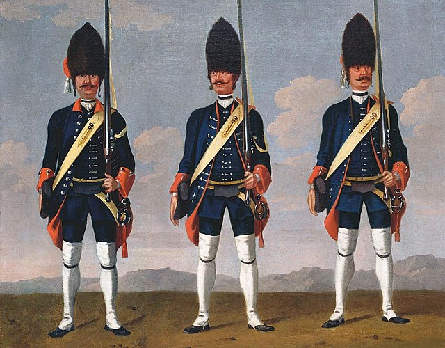 Swiss grenadiers from different regiments by the artist David Morier, c.1748, British Royal art collection. Note the mitre caps and the brass match ca
